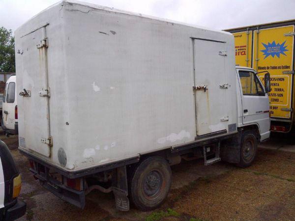 Left hand drive Isuzu NKR 55E 3.5 Ton isothermic box lorry. Year: 1993
