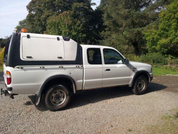 Ford Ranger Super Cab with winch and Truckman top.