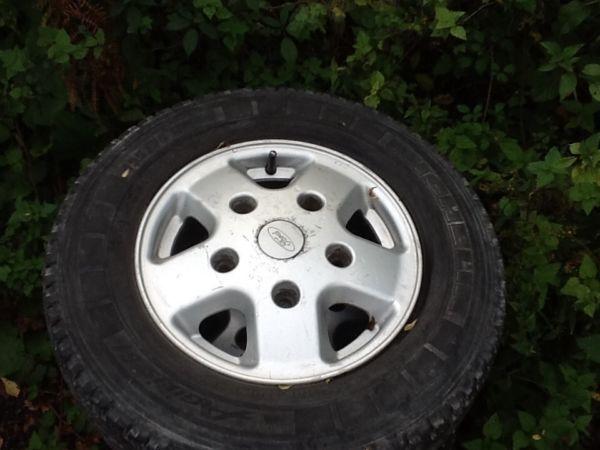 Set of 4. 14 inch transit alloy wheels with Michelin 195/75/14 less than half worn tyres